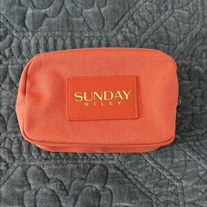Sunday Riley Orange Cosmetic Bag